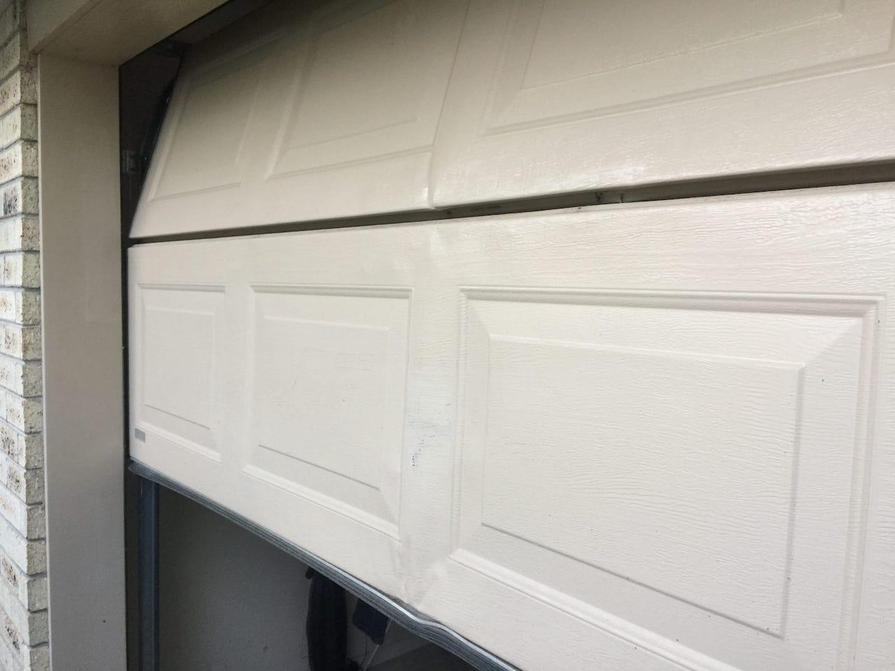 Garage door dents