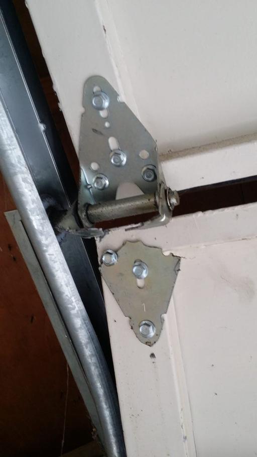 Minimalist Garage Door Hinge Replacement Cost for Small Space